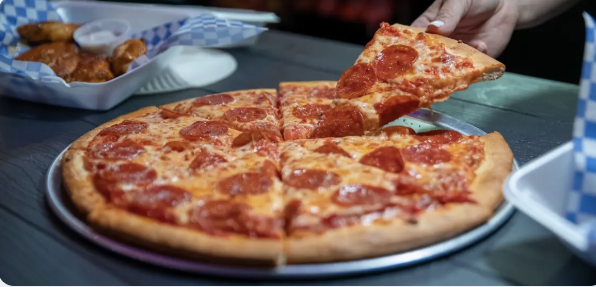 Fresh pepperoni pizza and wings from the Spin City snack bar
